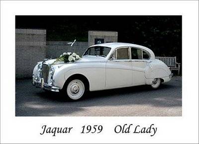 Trouwauto roomwitte Jaguar MK IX
